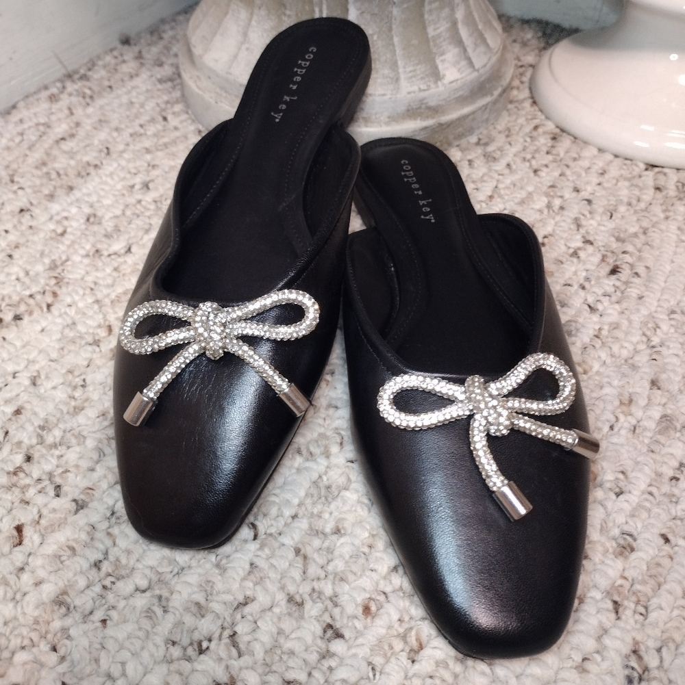 Copper Key Glimmer Black Leather Slip-On Mules with Rhinestone Bow Accent - Picture 2 of 8